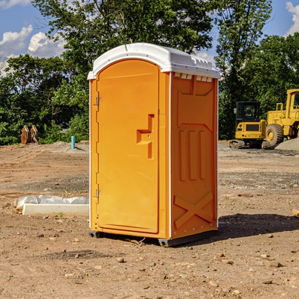 how often are the portable restrooms cleaned and serviced during a rental period in Tewksbury